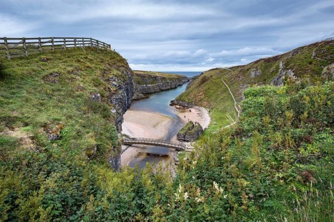 View from the viewpoint above Smoo Cave into the 800m long fjord Geodha Smoo