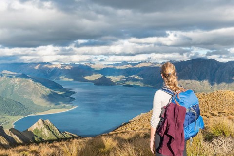 Female hiker looking at lake