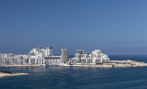 Spit of land with office and apartment buildings