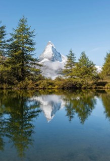 Snow-covered Matterhorn reflected in the lake
