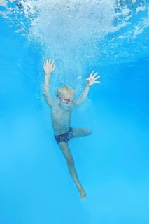 Little boy with swimming goggles