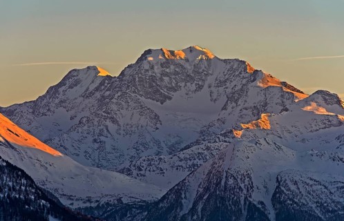 Evening sun on snowy peaks
