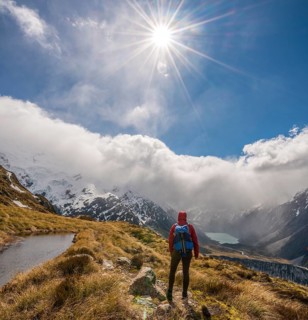 Hiker looking into Hooker Valley