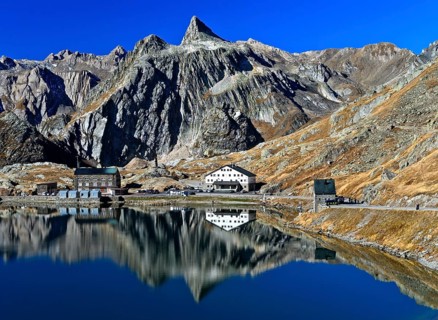 Reflection in the Lac du Grand St. Bernard mountain lake on the Grosse Sankt Bernhard Pass