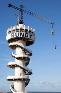 Bungy jump tower with bungy jumper
