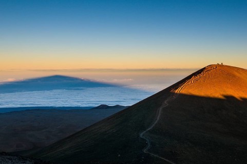 Mauna Kea in evening light casts a shadow