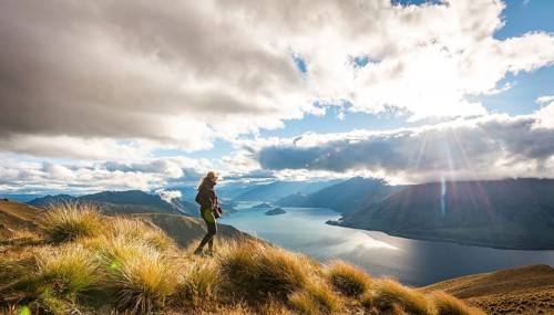 Female hiker looking at lake
