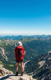 Hiker views of mountains and Alps