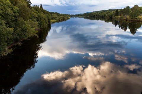 Reflection of clouds in river Klaralven