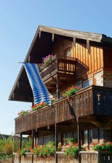 Old farmhouse with Bavarian flag