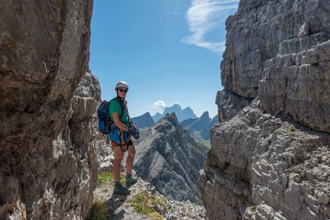 Woman on via ferrata to Averau