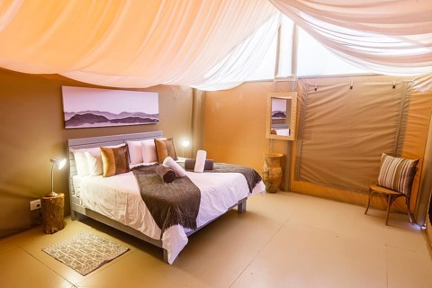 Double bed in luxury tent