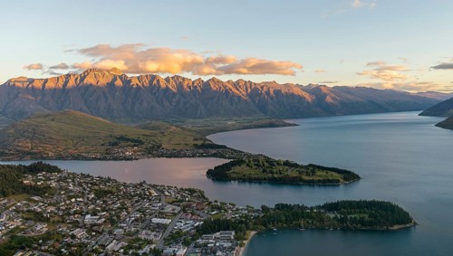 View of Lake Wakatipu and Queenstown at sunset