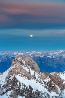 Santis Mountain overlooking Alpstein massif at full moon