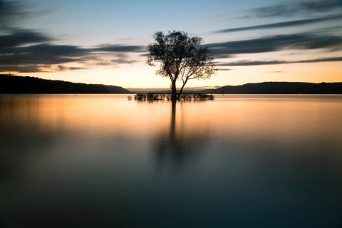 Evening atmosphere with sunset with clouds at Lake Constance