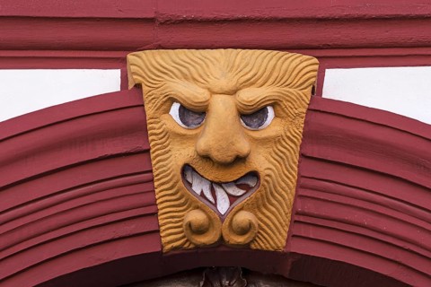 Grotesque above a gate entrance of an old farmstead from 1733