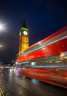 Red double-decker bus in front of Big Ben