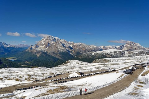 View from the Auronzo hut 2320 m over the toll road below the Three Peaks of Lavaredo to Lake Misurina and the Cristallino di Misurina 2775 m
