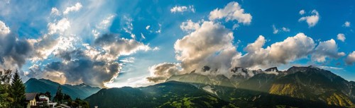 Alpine panoramay with cloud sky