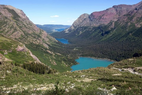 Mountain landscape at Grinnell Glacier Trail with View of Grinnell Lake