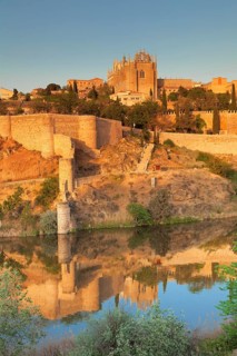 San Juan de los Reyes Church and city wall reflected in the River Tajo river