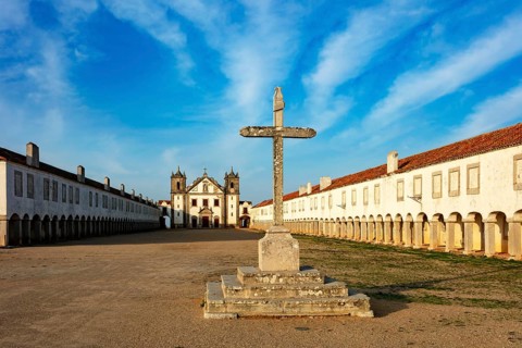 Cross in front of the pilgrimage church Nossa Senhora do Cabo