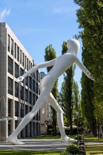 Walking Man sculpture by Jonathan Borofsky in front of insurance company Munich Re