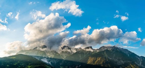 Alpine panorama with clouds