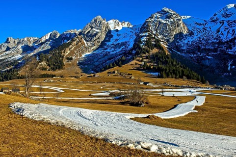Trail of artificial snow during a snowless winter