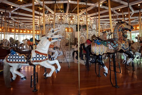 Historical children's merry-go-round with horses