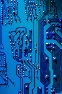 Blue and silver computer circuit board close-up