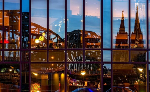 Reflection in glass facade of the Hyatt Regency Hotel