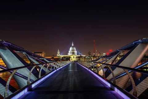 Illuminated Millennium Bridge and St. Paul's Cathedral