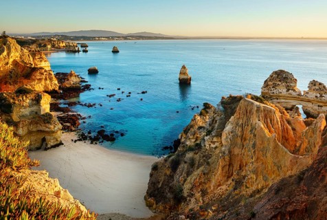 Beach and rocky coast Praia do Camilo