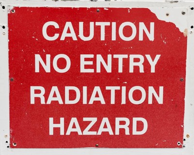 Lettering Caution no entry radiation hazard