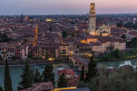 View at dusk from the hill of San Pietro to the old town
