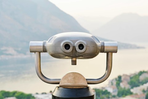 Coin operated binoculars