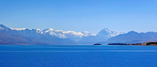 Deep blue glacial Lake Pukaki with mountains