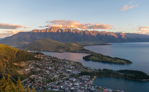 View of Lake Wakatipu and Queenstown at sunset