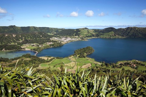View from Miradouro do Cerrado das Freiras into the volcanic crater Caldera Sete Cidades with the crater lakes Lagoa Verde and Lago Azul