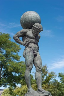 Statue of Atlas with globe on his shoulders