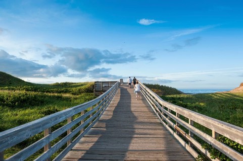 Wooden pier leading to beach of Prince Edward Island National Park