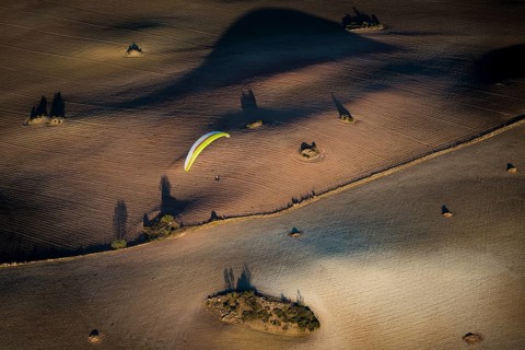 Paragliding over fields