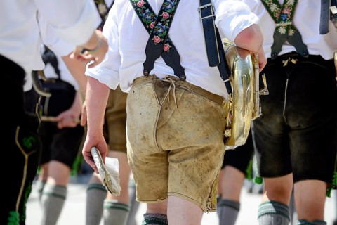 Musicians in leather trousers and Tuba