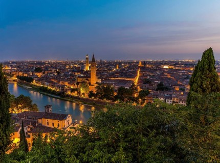 View at dusk from the hill of San Pietro to the old town