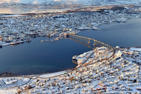 Snowy town with bridge