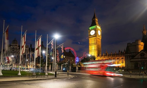 Red double-decker bus in front of Big Ben