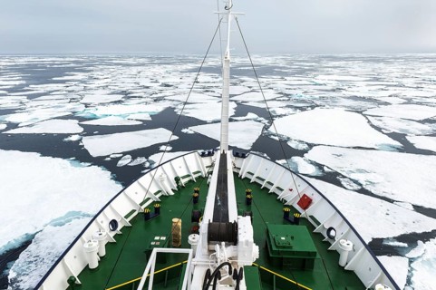 Expedition Boat navigating through melting pack ice