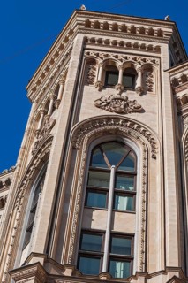 Bay window with arched window on the facade