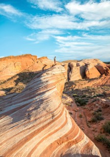 Young man on Fire Wave Rock